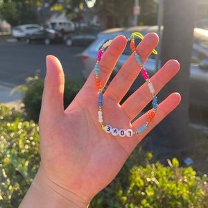 Beaded “LOVE” phone chain.